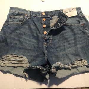 Woman’s distressed high rise button fly Jean shorts